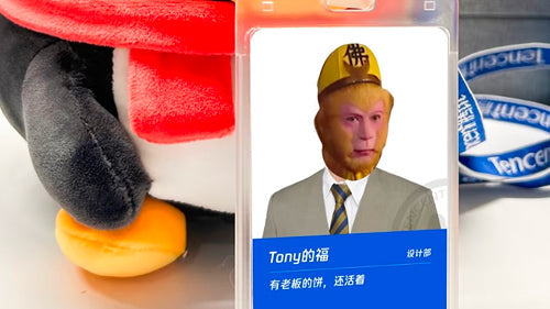 Humorous employee ID badge featuring monkey character with English name Tony, alongside Tencent branding