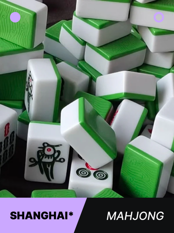 Stack of green-backed mahjong tiles in Chengdu, showcasing the colorful and tactile elements of traditional Chinese gameplay