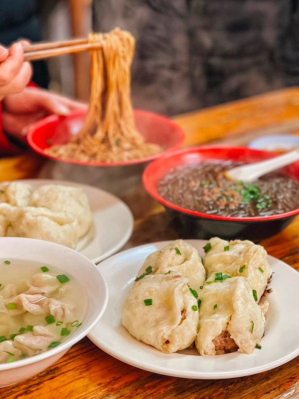 Steamed dumplings and noodle soup served at a traditional Hangzhou breakfast restaurant