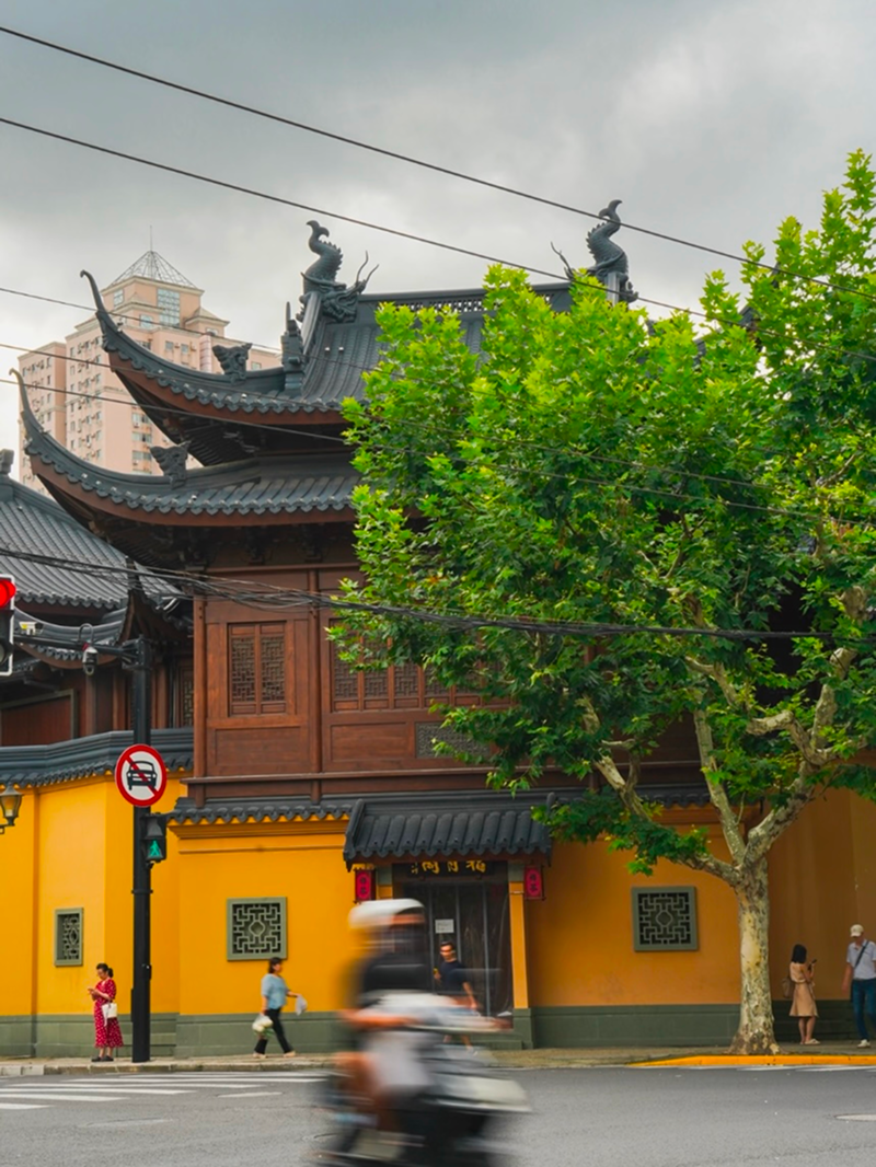 Yellow temple walls and curved roof architecture at Jade Buddha Temple Shanghai