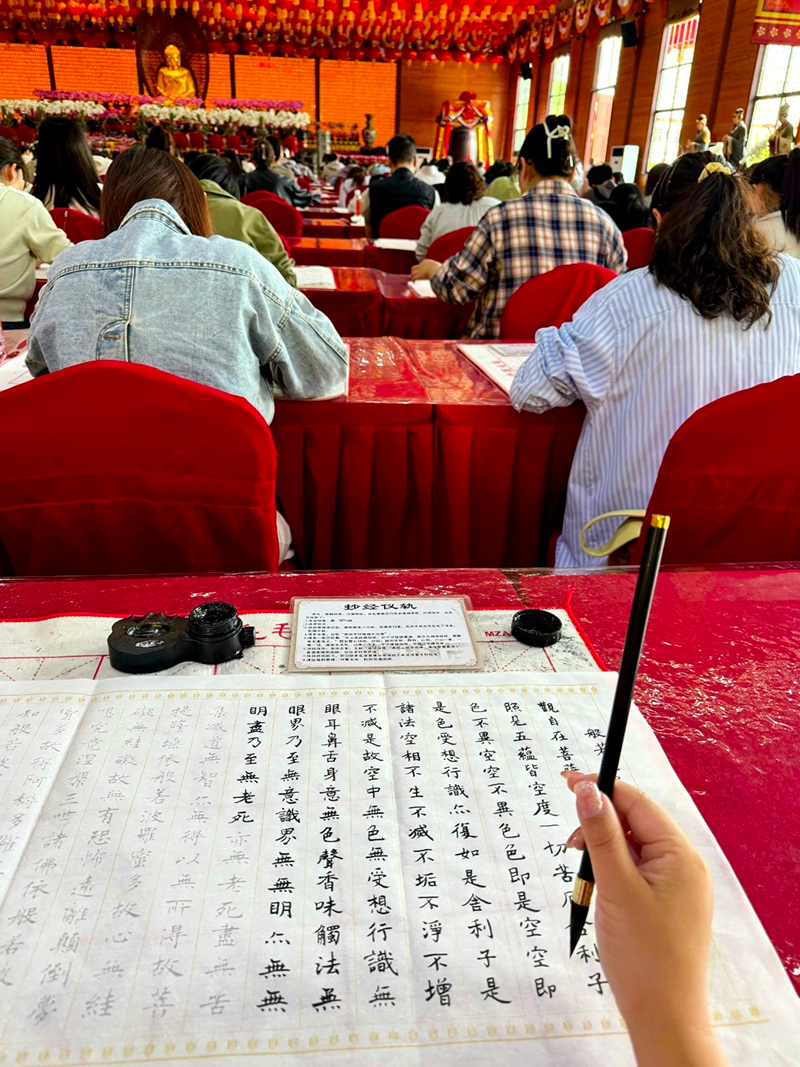 Calligraphy meditation class in Shanghai with students practicing Chinese characters
