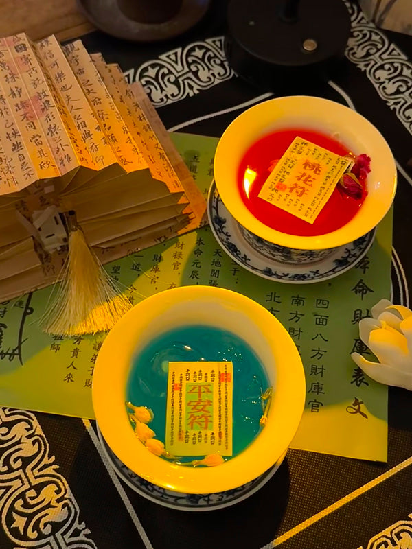 Taoism-inspired ritual drinks in traditional bowls, surrounded by spiritual symbols and incantation papers in Chengdu
