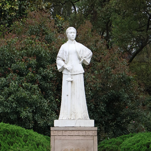 The statue of Qiu Jin at her tomb by West Lake in Hangzhou—a revolutionary heroine forever watching over the waters she loved.